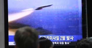 North Korea test-fires 2 more missiles